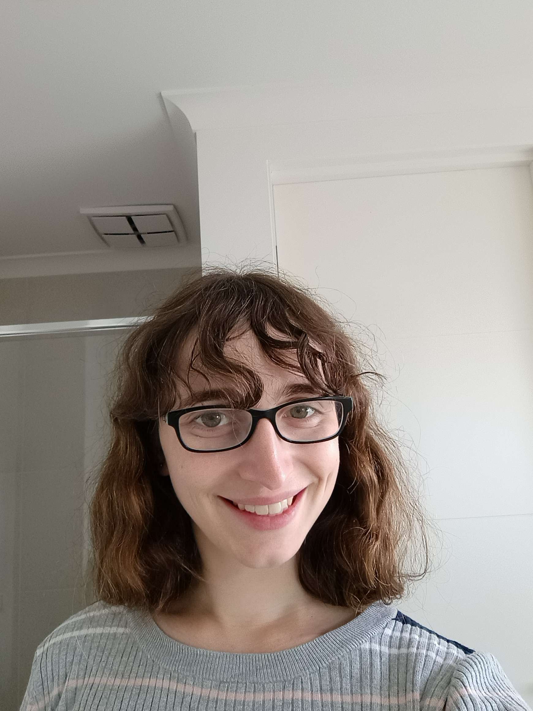 Visual designer wearing a hat